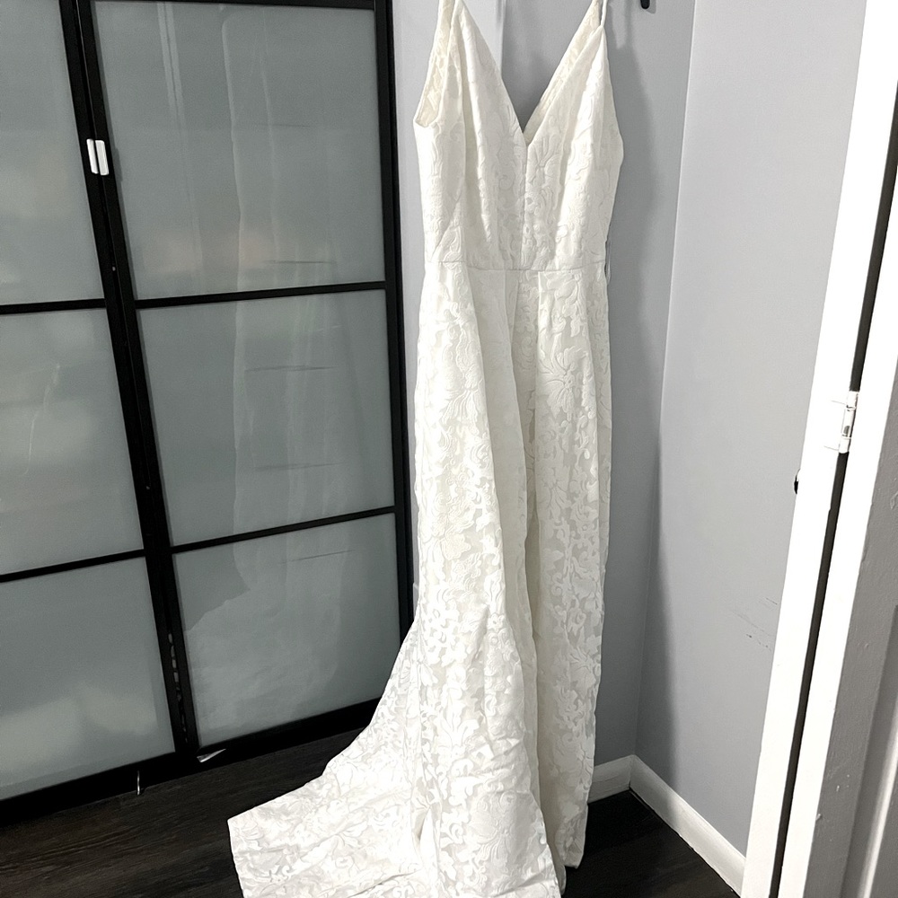 Calvin Klein Wedding dress with small trail